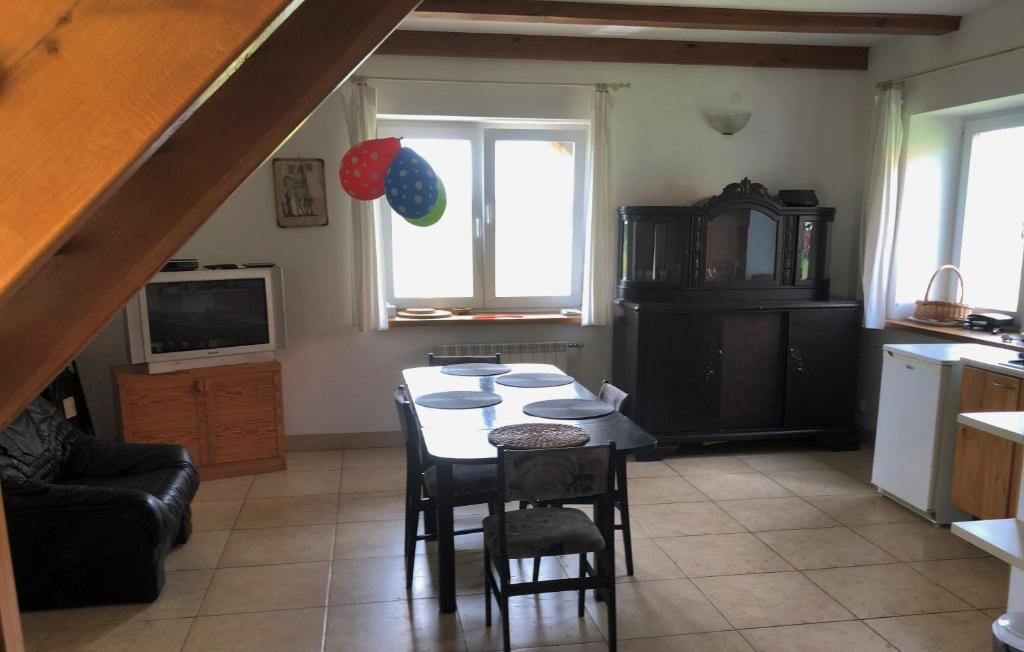 Kuchyň nebo kuchyňský kout v ubytování Siedlisko nad Rosiem