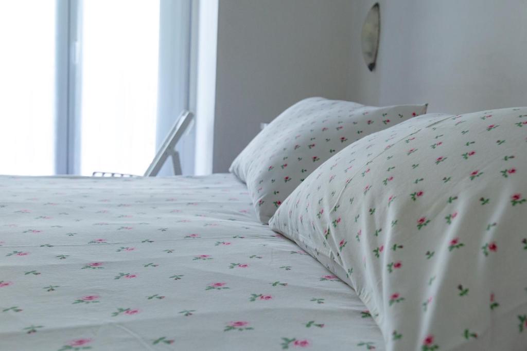 Postel nebo postele na pokoji v ubytování Hotel Spiaggia
