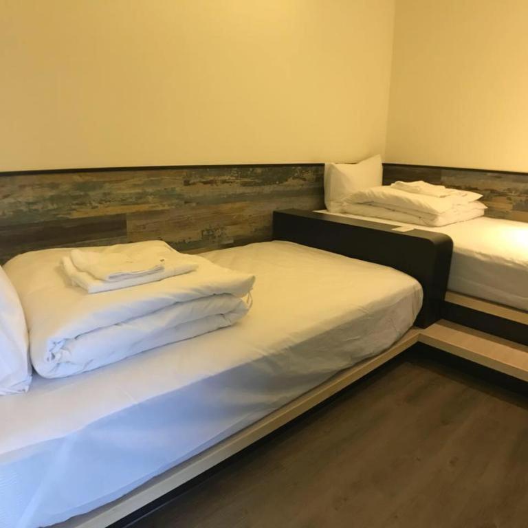 Postel nebo postele na pokoji v ubytování Tropical Fish B&B