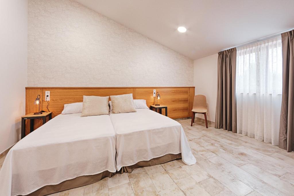 Posteľ alebo postele v izbe v ubytovaní Hotel rural La Tejera