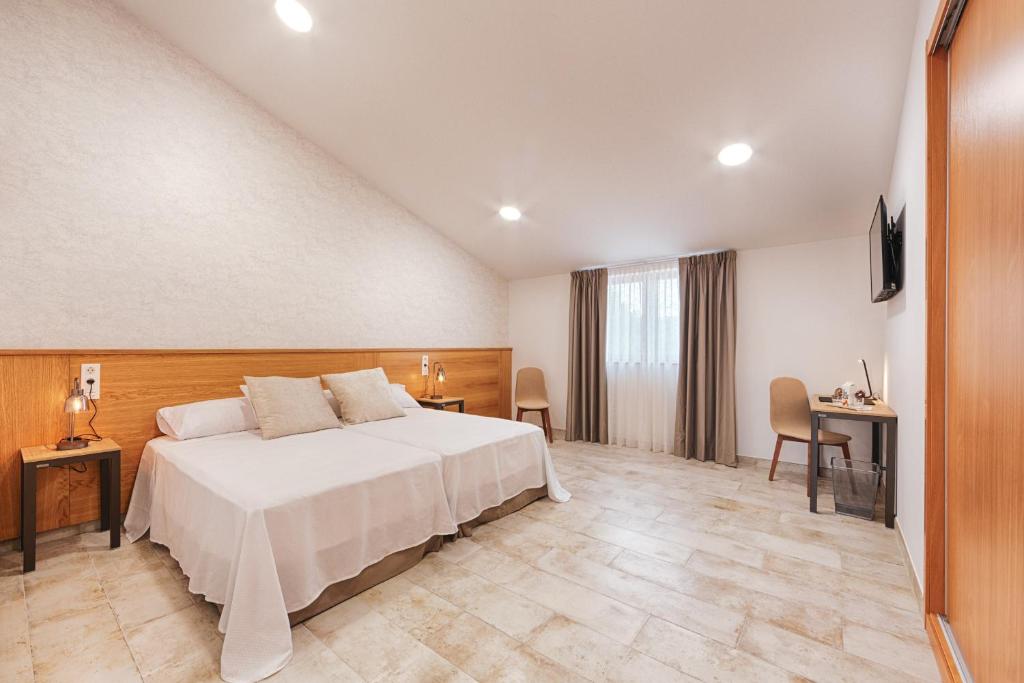 Posteľ alebo postele v izbe v ubytovaní Hotel rural La Tejera