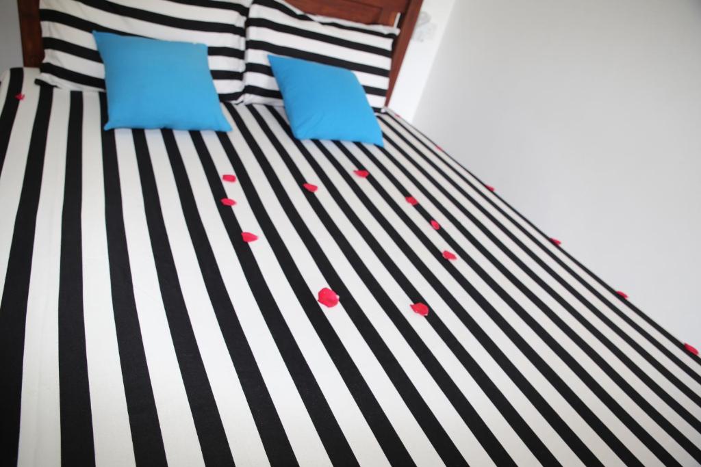 Postel nebo postele na pokoji v ubytování Ella Villa Nine Arch
