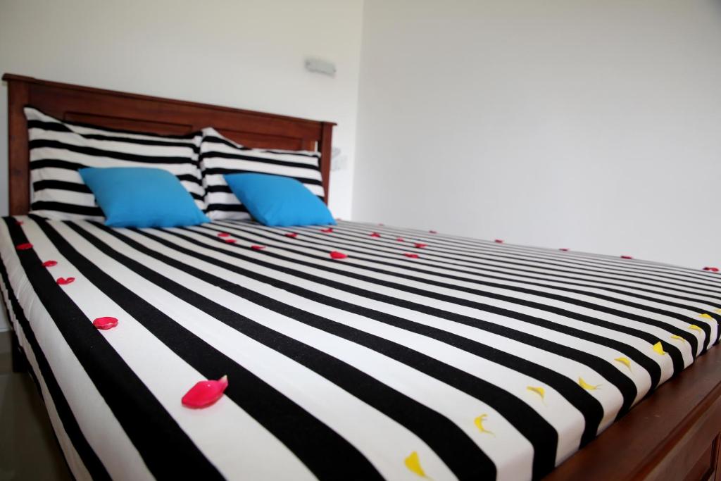 Postel nebo postele na pokoji v ubytování Ella Villa Nine Arch
