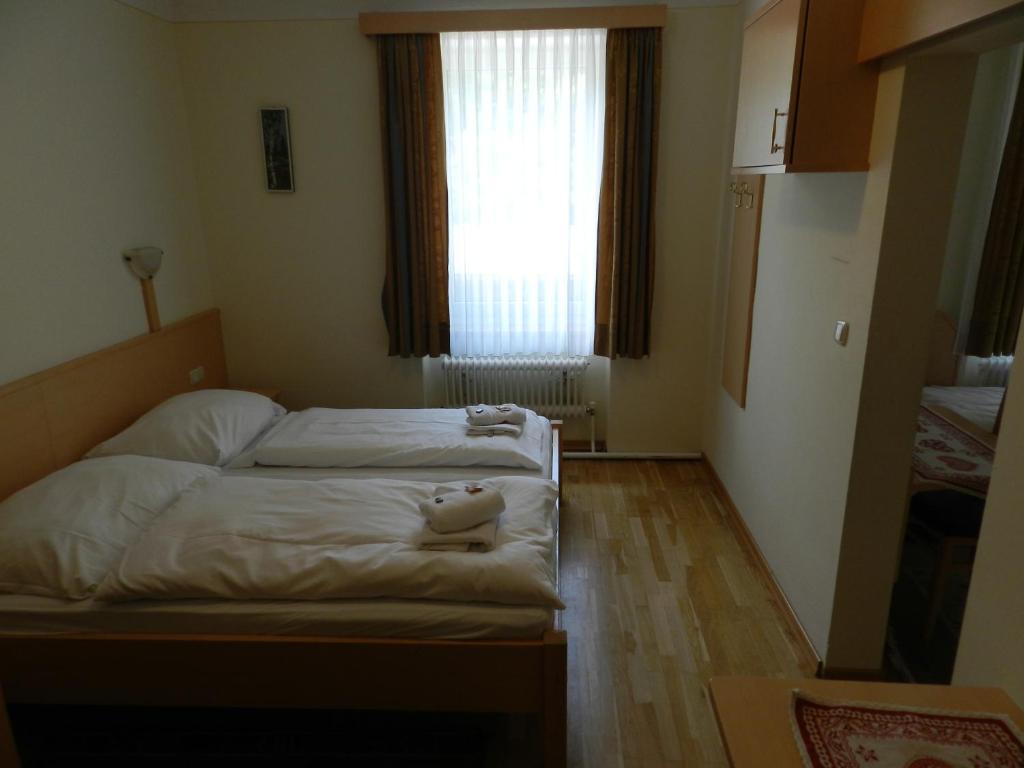 Postel nebo postele na pokoji v ubytování Freinerhof & Wellness
