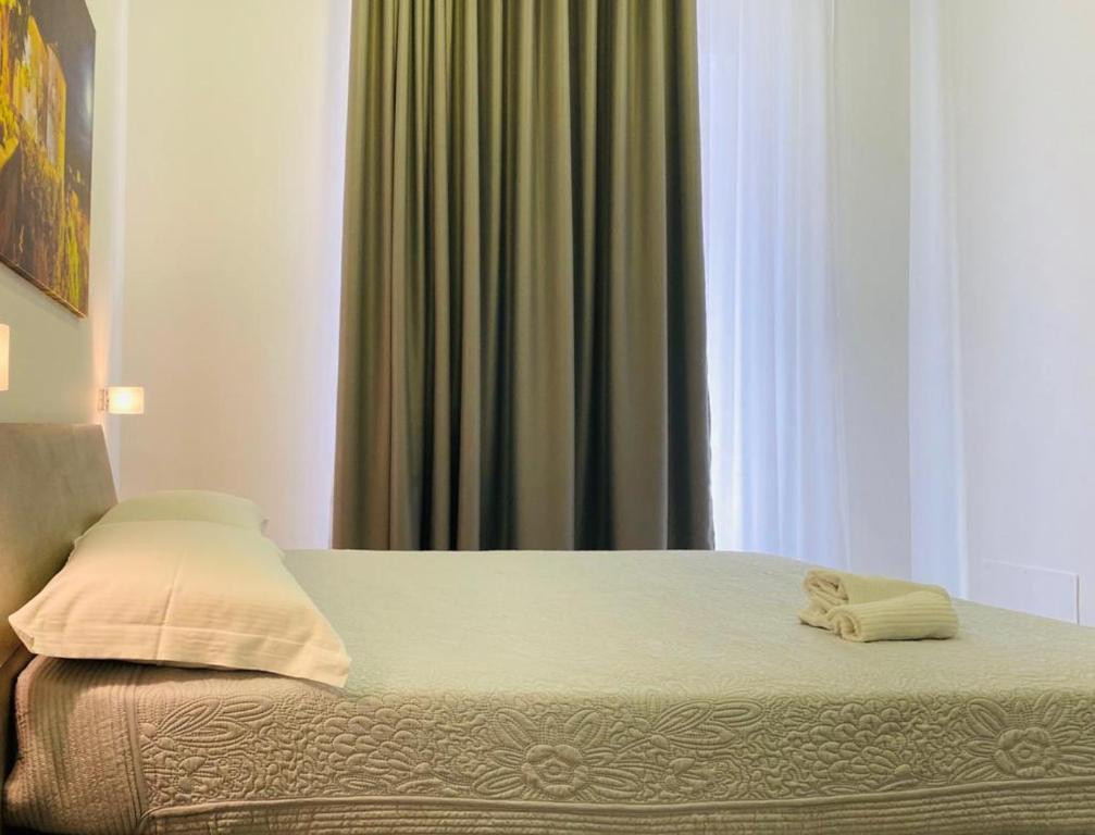 Letto o letti in una camera di InCentroScalea B&B