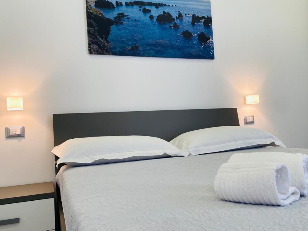 Letto o letti in una camera di InCentroScalea B&B