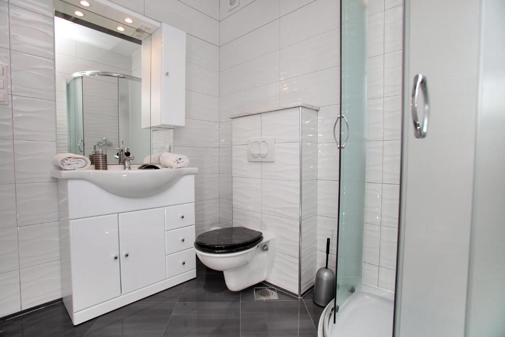 Kúpeľňa v ubytovaní Apartments ITD