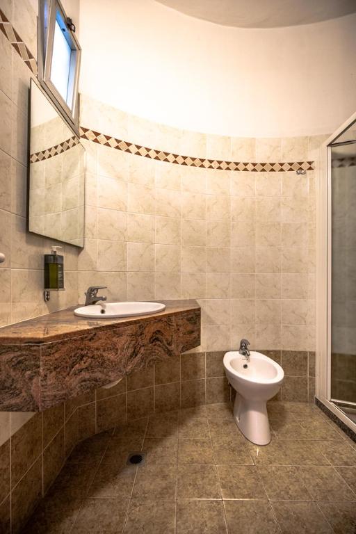 Koupelna v ubytování Hotel Susy