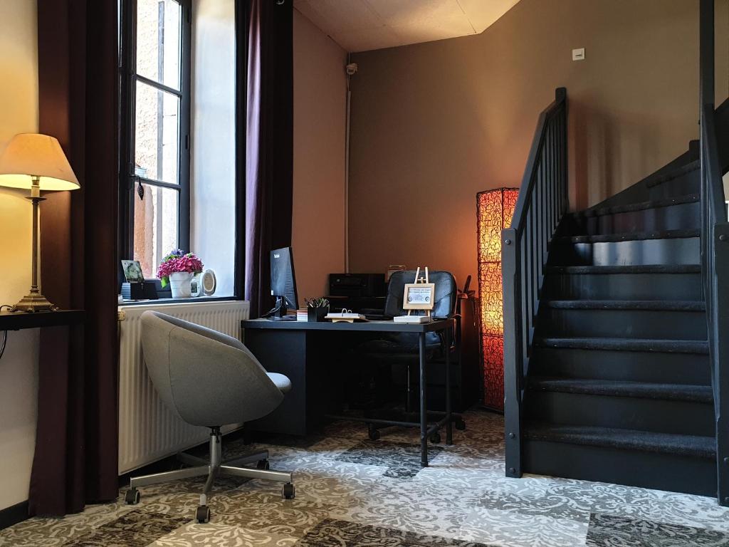 Posezení v ubytování Le Relais Des Dix Crus - Logis Hôtel B&B