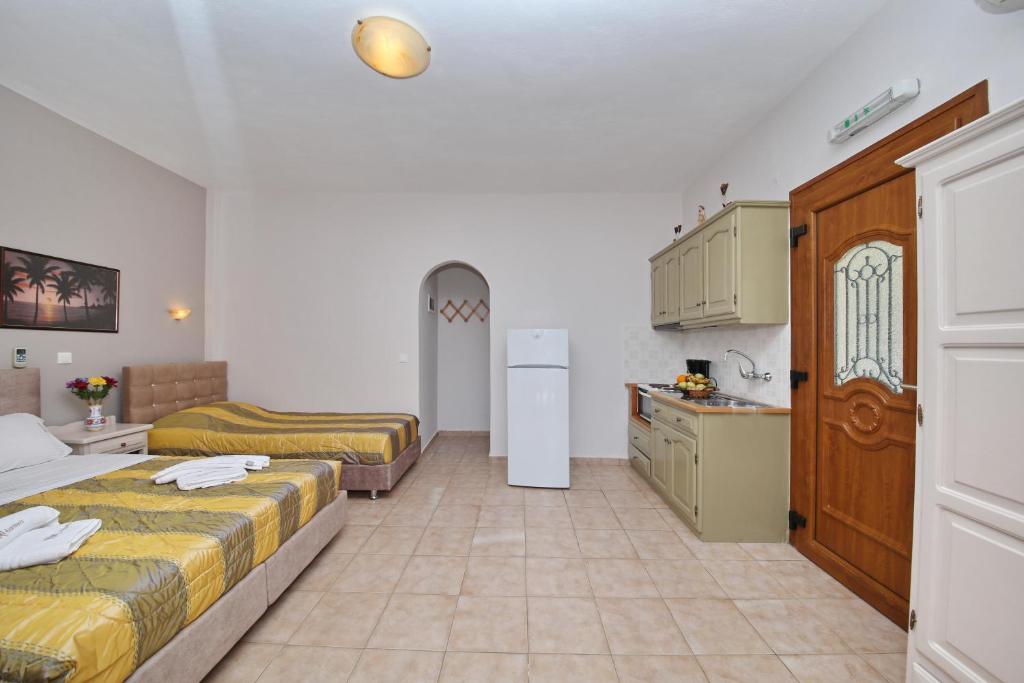 Кровать или кровати в номере Niki Apartments