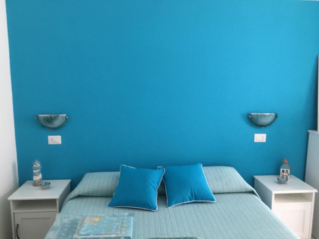 Postel nebo postele na pokoji v ubytování casa Wela