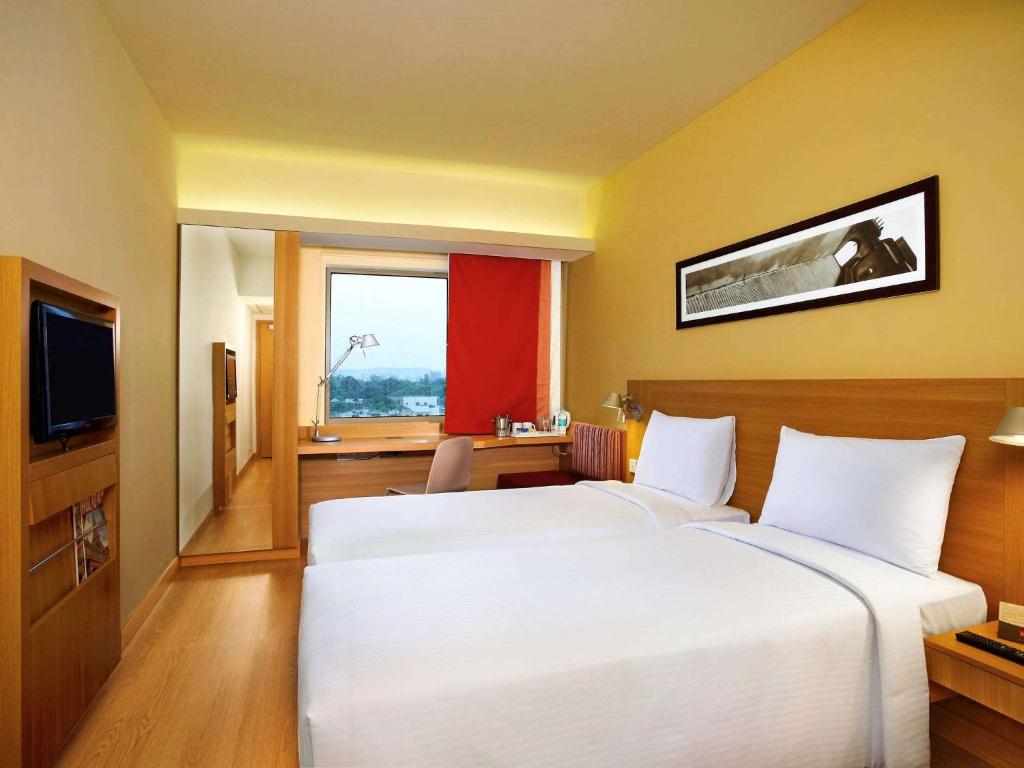 Voodi või voodid majutusasutuse ibis Gurgaon Golf Course Road - An Accor Brand toas