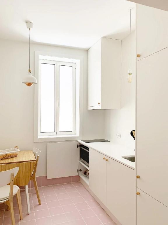 Kuchyň nebo kuchyňský kout v ubytování Guest House Arca de Água