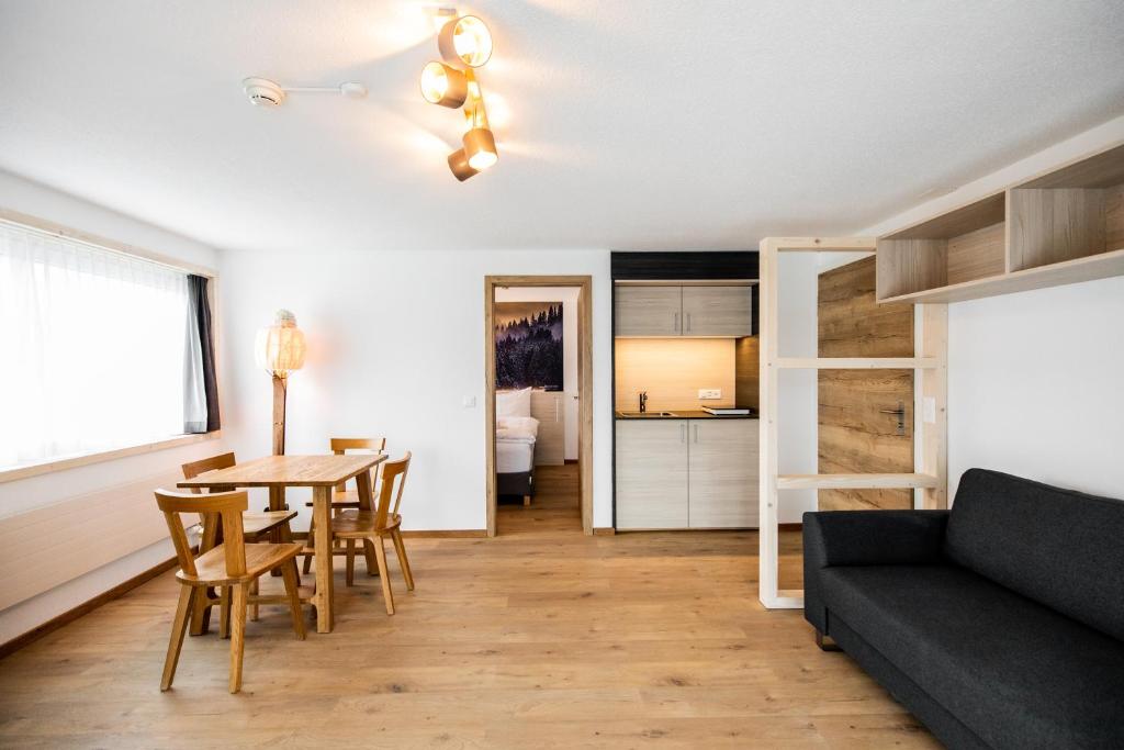 Postel nebo postele na pokoji v ubytování Roggenstock Lodge
