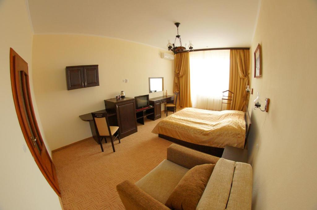 Postel nebo postele na pokoji v ubytování Erney Laz Hotel