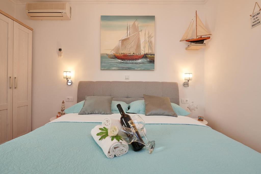 Postel nebo postele na pokoji v ubytování Rooms Antonio