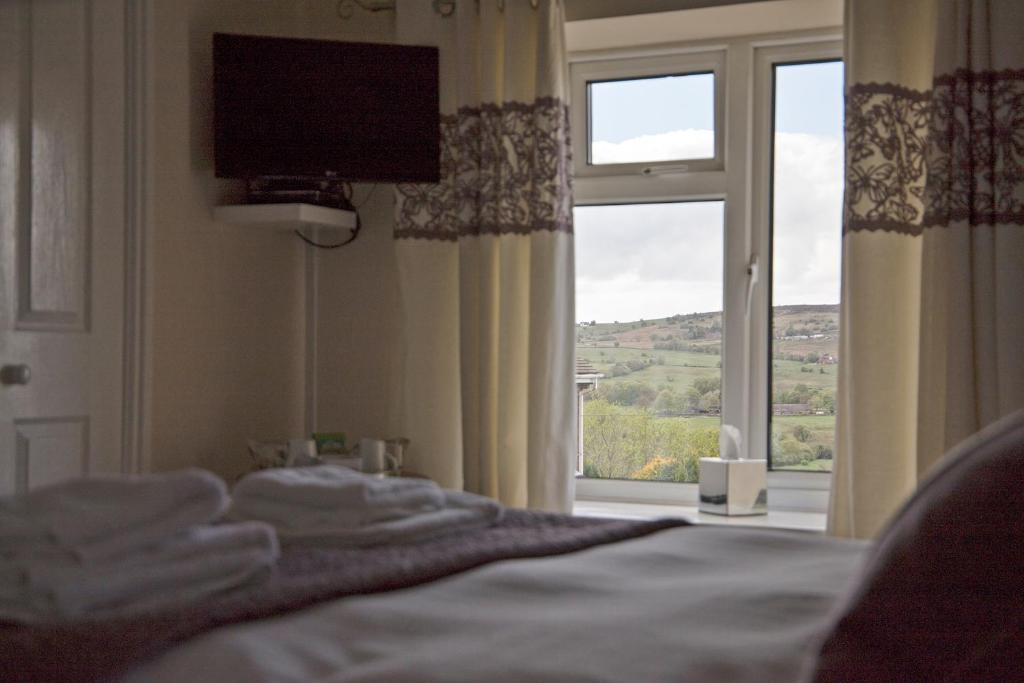 Postel nebo postele na pokoji v ubytování Moorland View Farm B&B