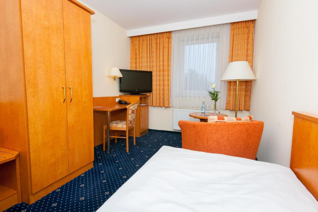TV a/nebo společenská místnost v ubytování Hotel Englischer Hof