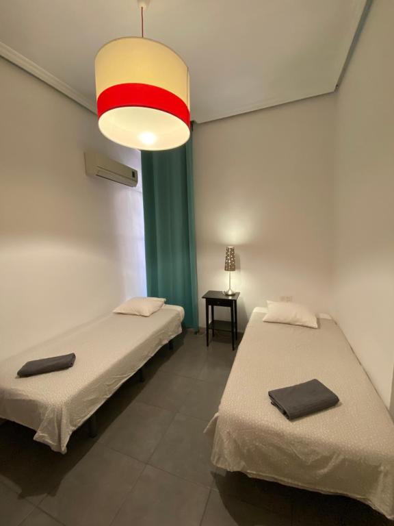 Cama o camas de una habitación en Barbieri Sol Hostel