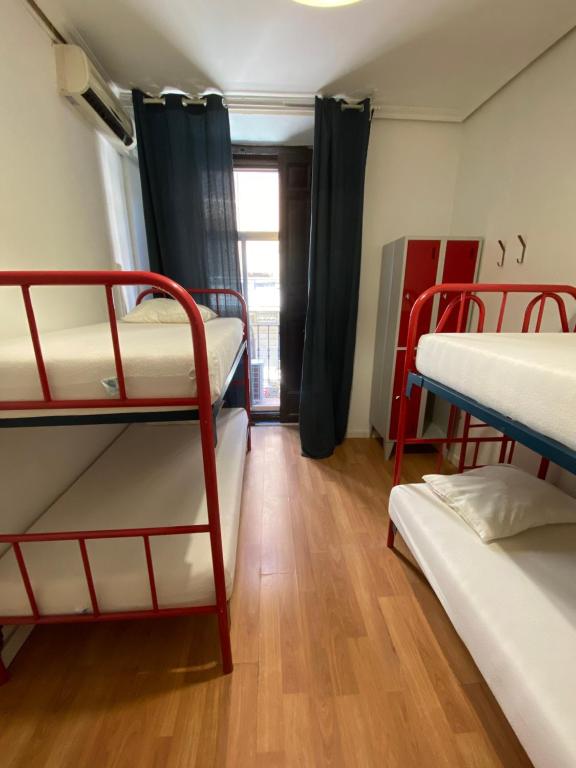 Cama o camas de una habitación en Barbieri Sol Hostel