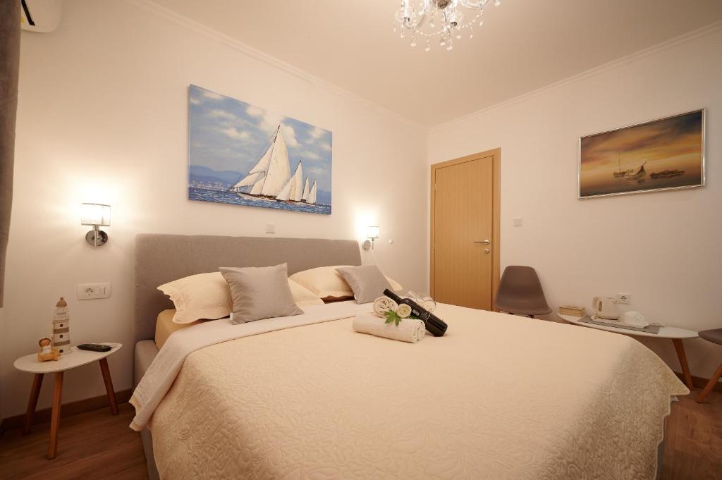 Postel nebo postele na pokoji v ubytování Rooms Antonio