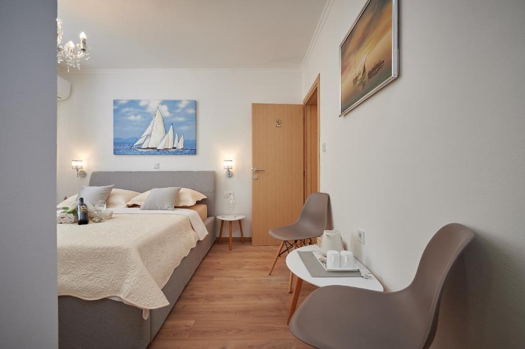 Postel nebo postele na pokoji v ubytování Rooms Antonio
