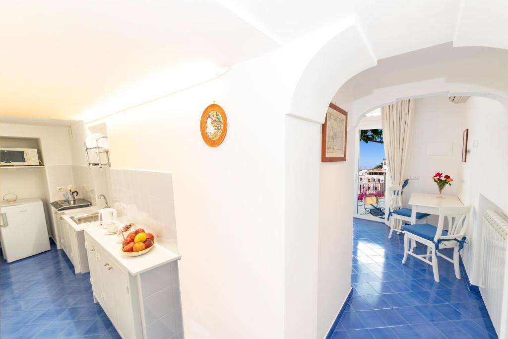 Kuchyň nebo kuchyňský kout v ubytování Casa Maresca Residence