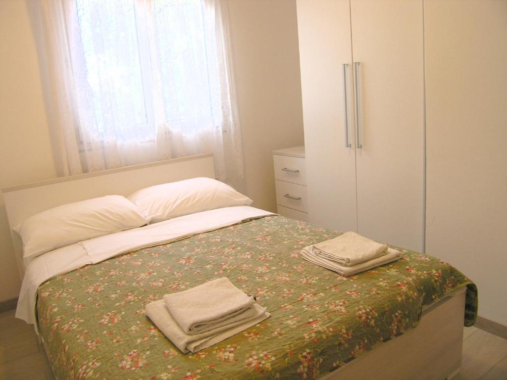Posteľ alebo postele v izbe v ubytovaní Apartments Sokolović