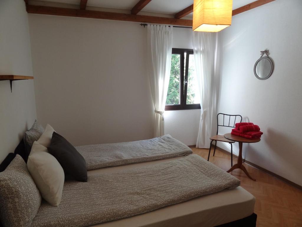 Ein Bett oder Betten in einem Zimmer der Unterkunft Locanda Zott
