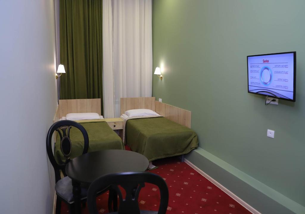 TV a/nebo společenská místnost v ubytování Araks Hotel Complex