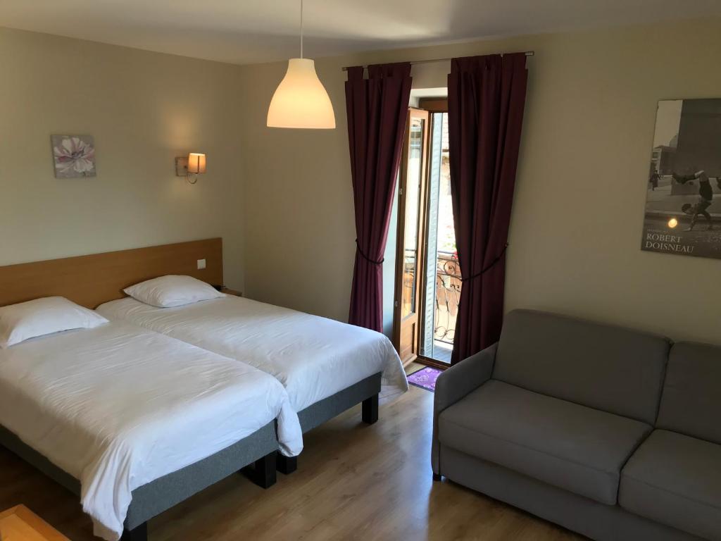 Katil atau katil-katil dalam bilik di Auberge de La Fontaine