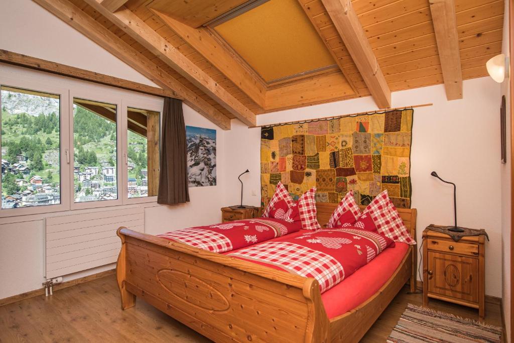 Llit o llits en una habitació de BaseCamp Apartments