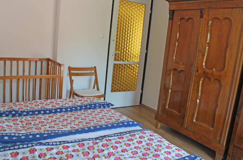 Posteľ alebo postele v izbe v ubytovaní Illés Apartman