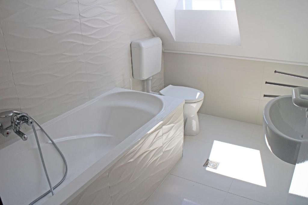 Kúpeľňa v ubytovaní Illés Apartman