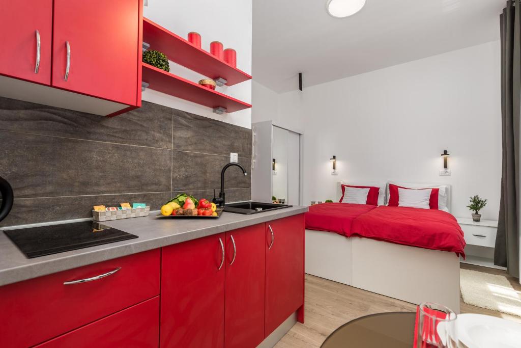 Kuchyň nebo kuchyňský kout v ubytování Quiet Center Apartments