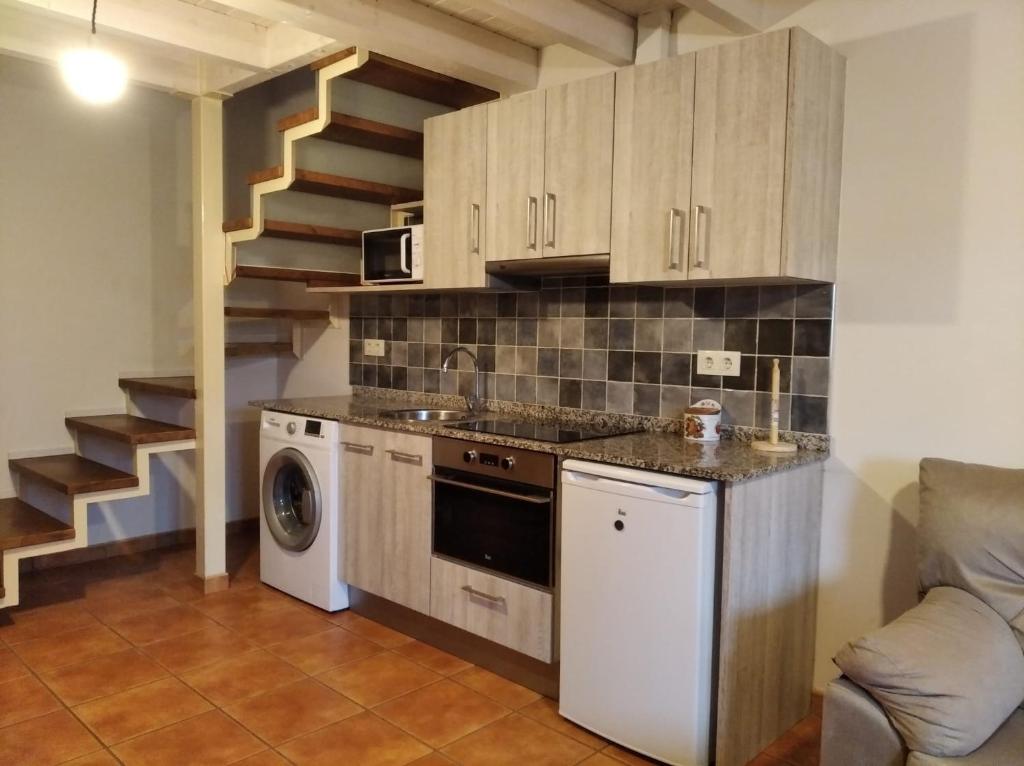 Virtuvė arba virtuvėlė apgyvendinimo įstaigoje Apartamento Alba