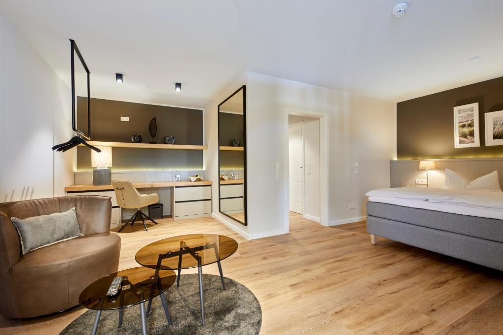 Postel nebo postele na pokoji v ubytování Hotel Friesenhof