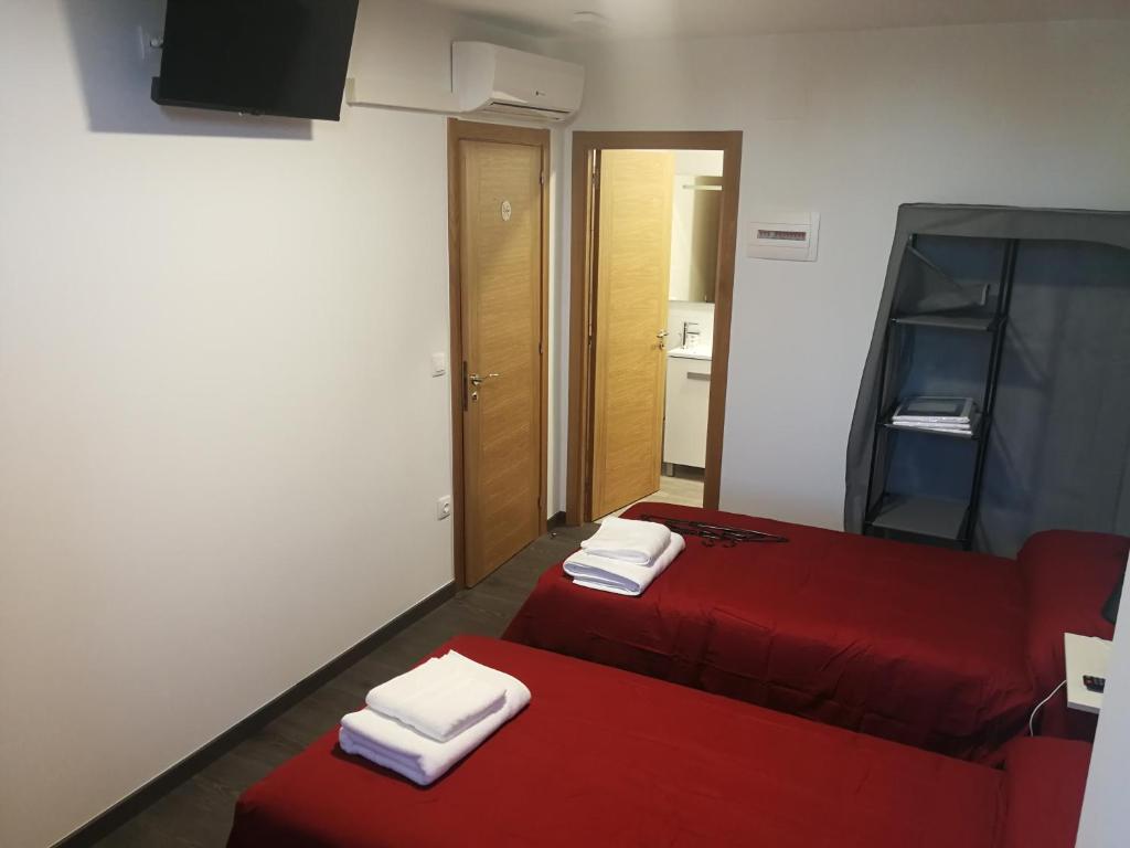Postel nebo postele na pokoji v ubytování Pensión Tasaga