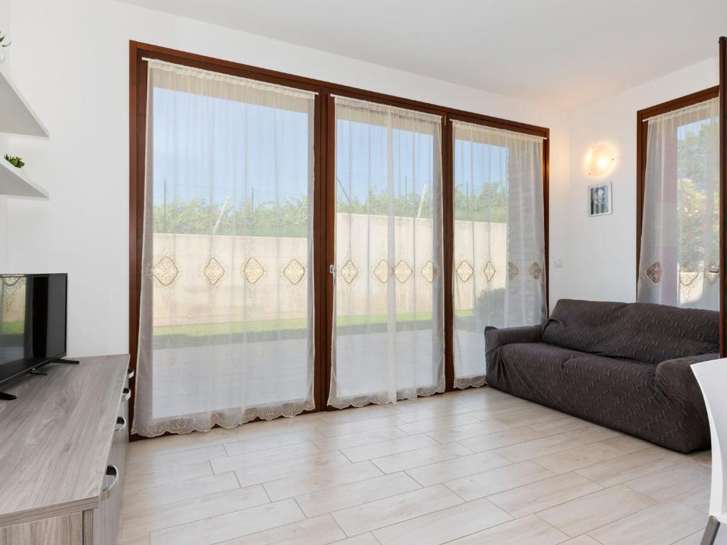 Część wypoczynkowa w obiekcie Holiday Home in Lazise near Lake Garda