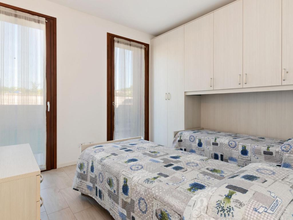 Łóżko lub łóżka w pokoju w obiekcie Holiday Home in Lazise near Lake Garda