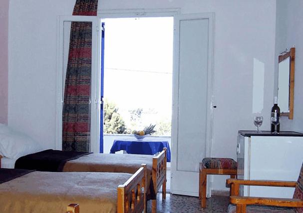 Postel nebo postele na pokoji v ubytování Babis Hotel