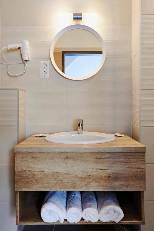Koupelna v ubytování Hotel Adalbert Szent Tamás ház