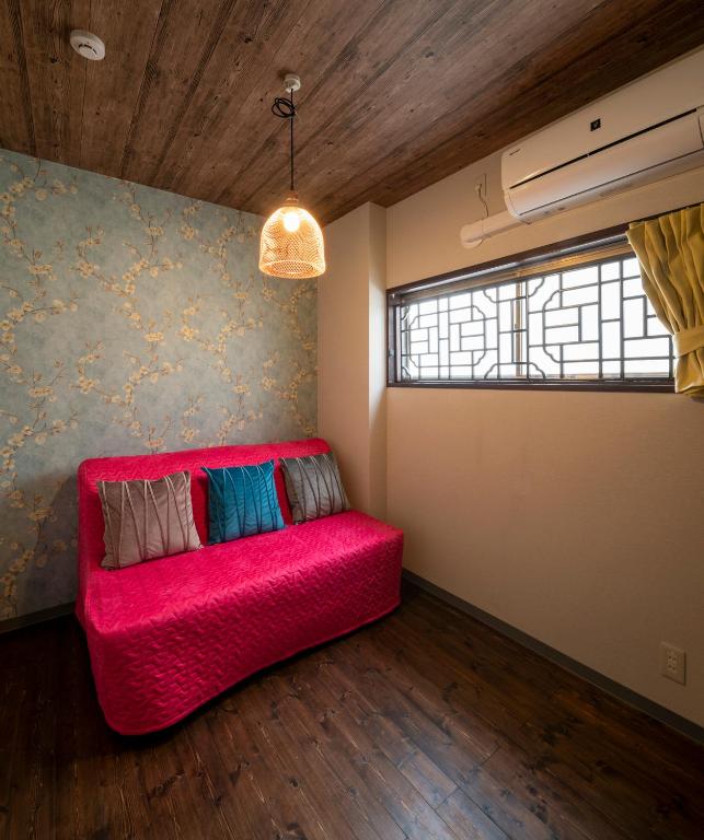 Postel nebo postele na pokoji v ubytování Room Inn Shanghai 横浜中華街 Room1-ABC