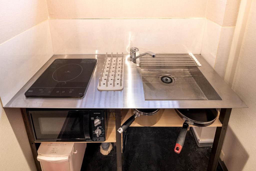Kuchyň nebo kuchyňský kout v ubytování Room Inn Shanghai 横浜中華街 Room1-ABC