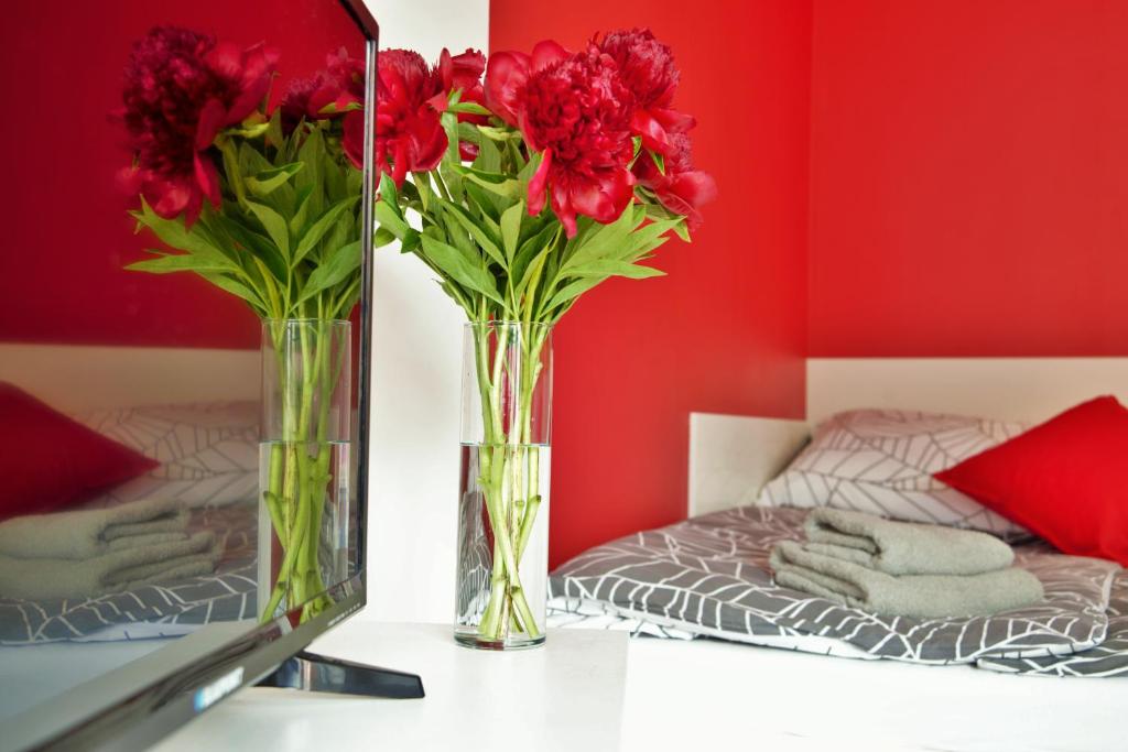 Posteľ alebo postele v izbe v ubytovaní Ideal Apartments Red