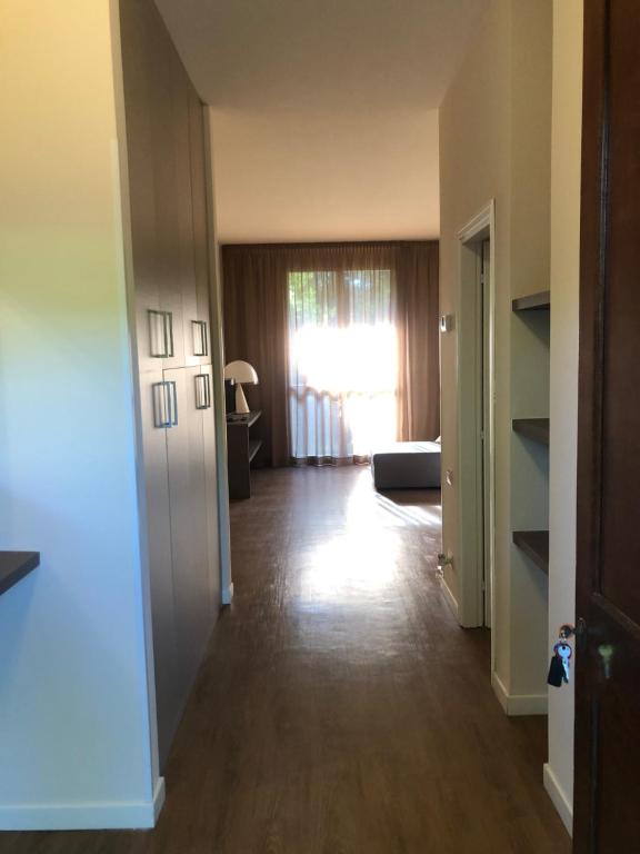 Posteľ alebo postele v izbe v ubytovaní Residenze Al Colle Dei Pini