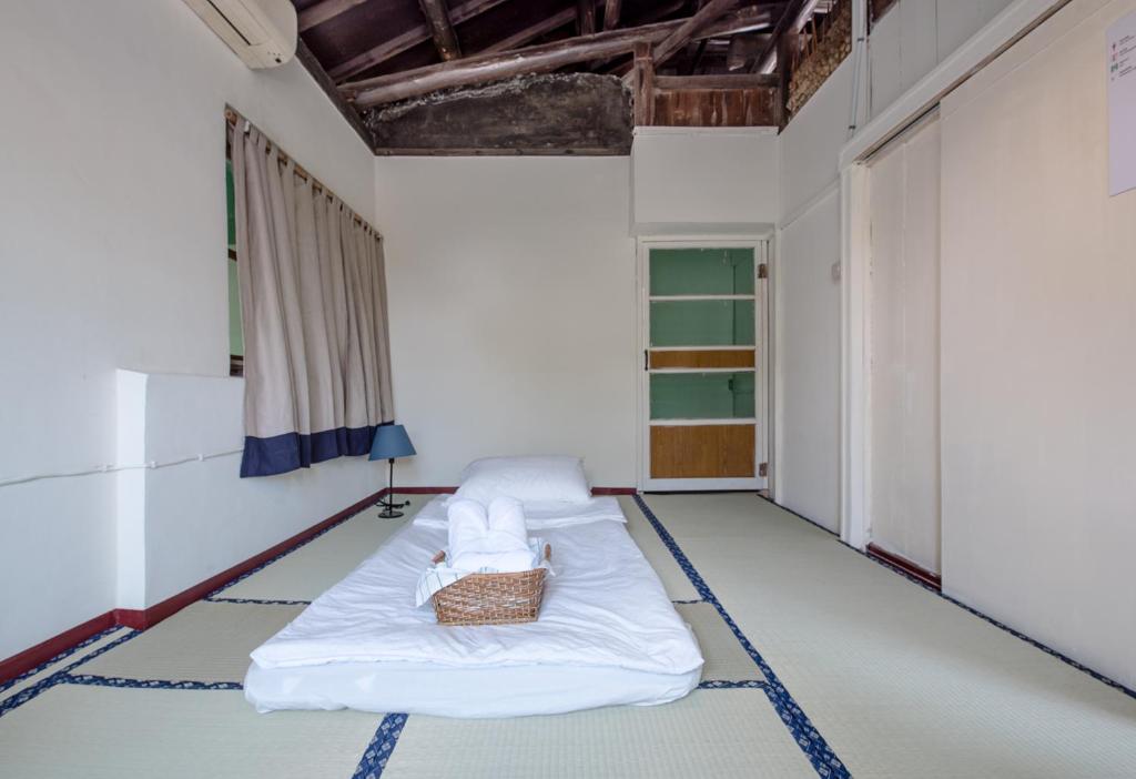 Letto o letti in una camera di ZYIN Homestay