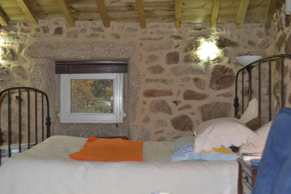 Postel nebo postele na pokoji v ubytování Penedino Mountain Cottage