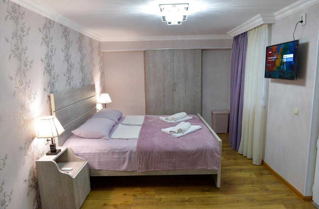Postel nebo postele na pokoji v ubytování Cozy House
