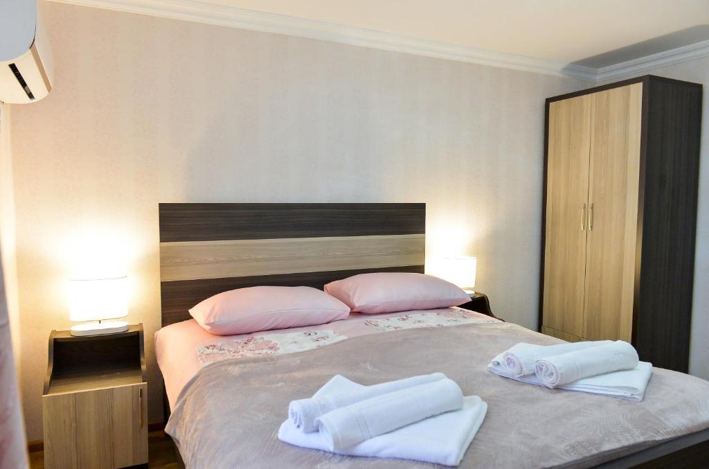 Postel nebo postele na pokoji v ubytování Cozy House
